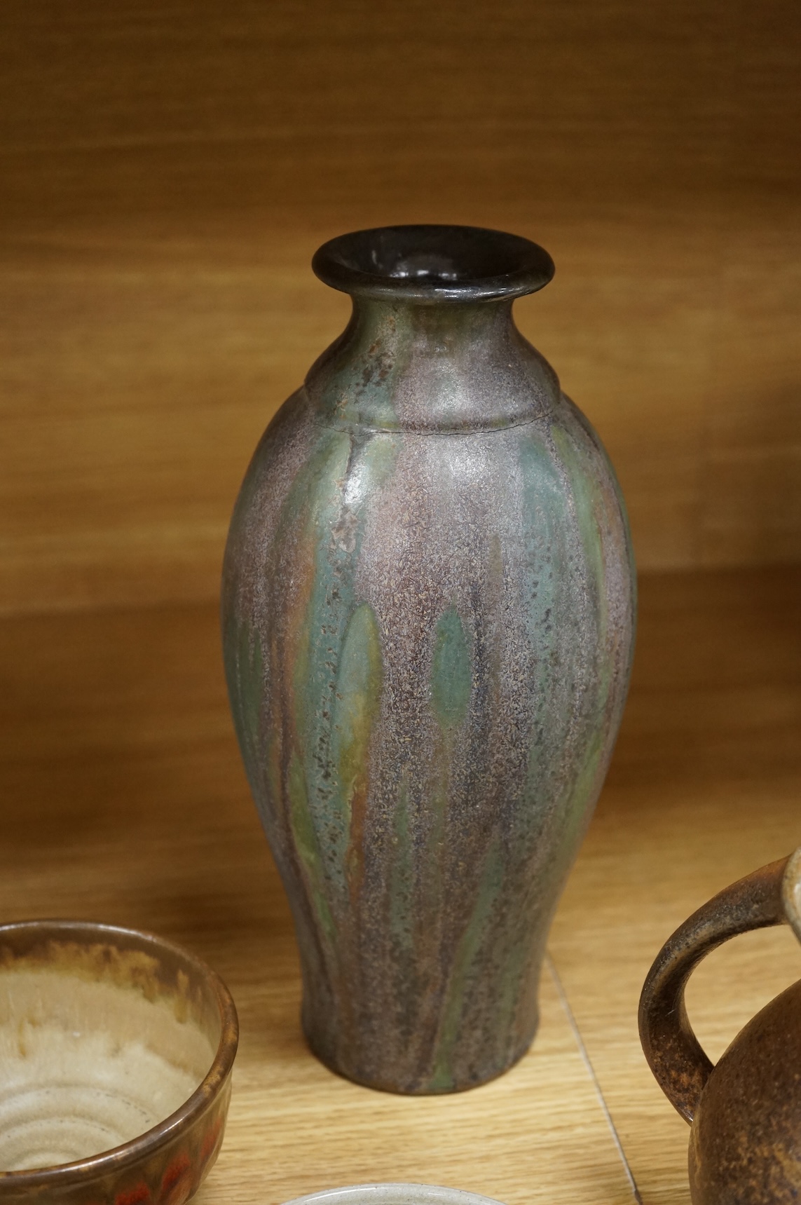 Six pieces of Studio pottery and a vase, largest 32cm high